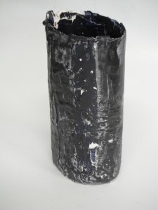 Enamelled porcelain over magazine paper