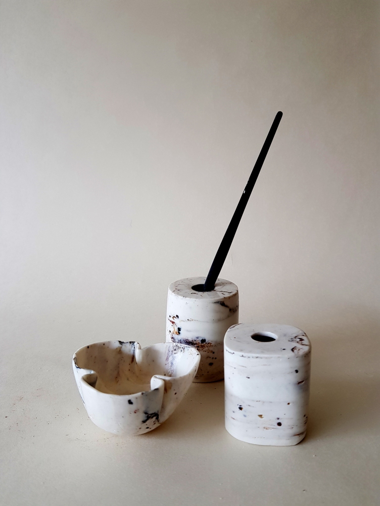 Porcelain ink wells with added clay from the River Thames