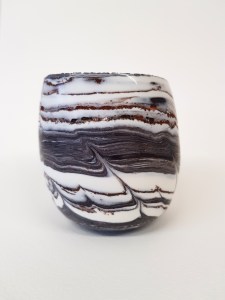 Ceramics egg vessel using porcelain and found materials designed to be held.  Fragile and stunningly beautiful